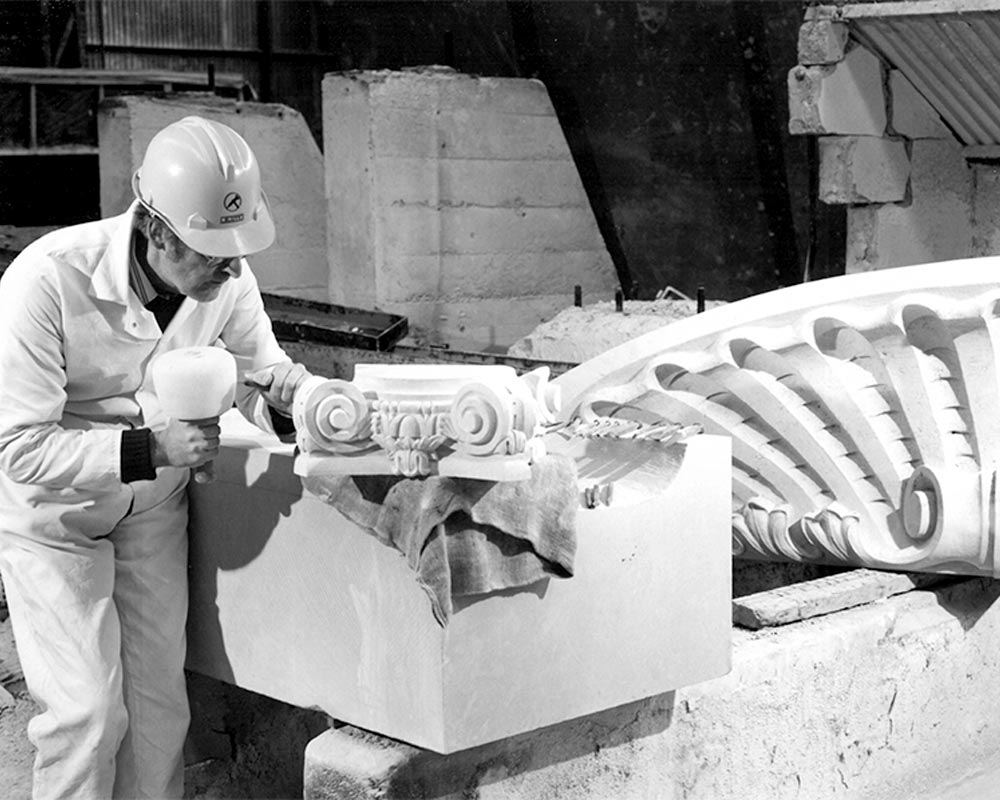John Selman working portico stones