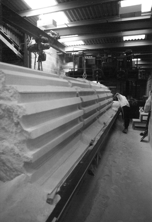 Planer working Portland limestone fluted columns